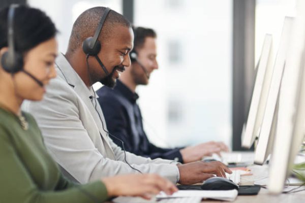 Shot of call centre agents working in an office